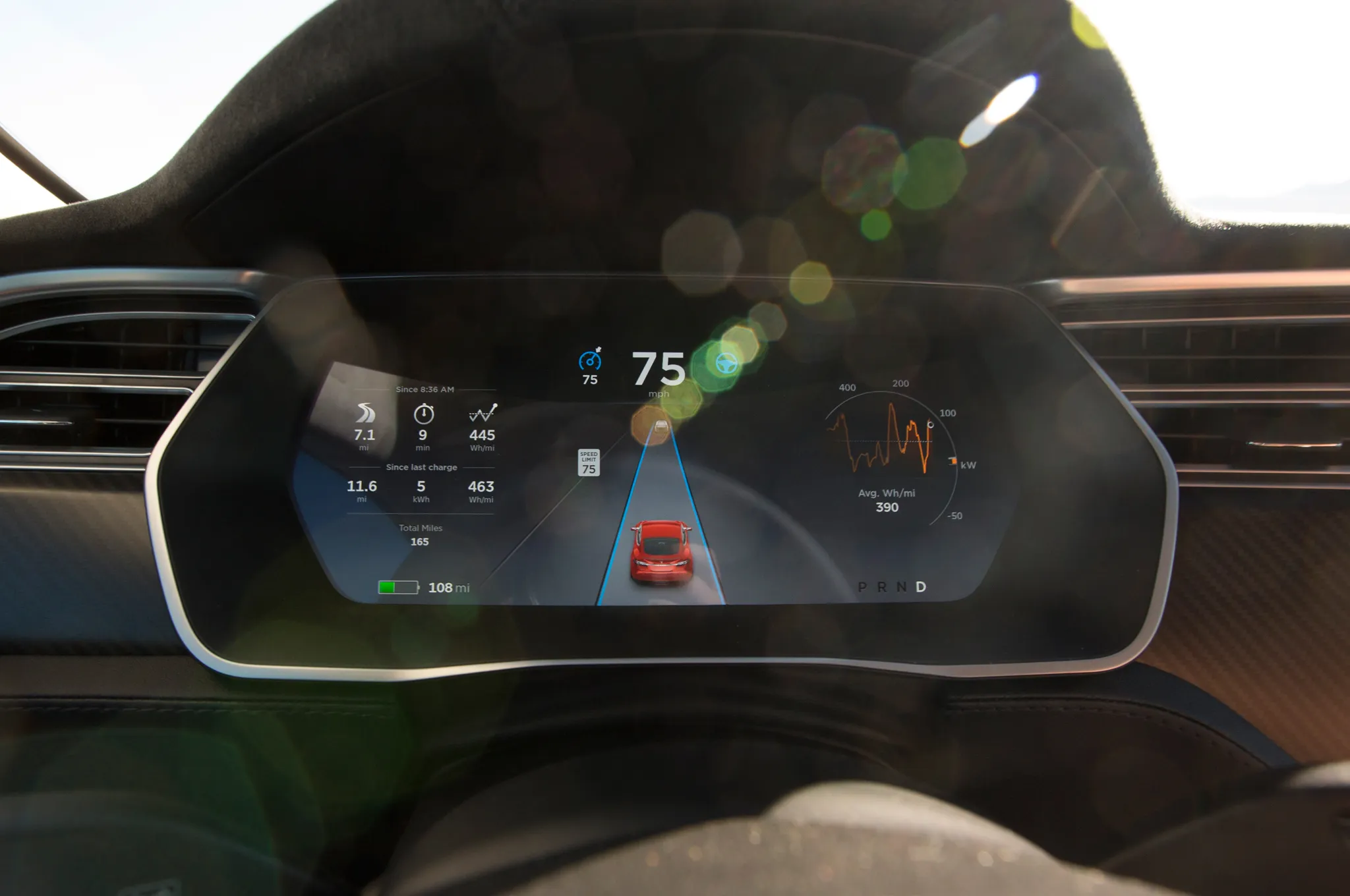 Tesla Model S instrument cluster showing Autopilot engaged with lane and vehicle visualization